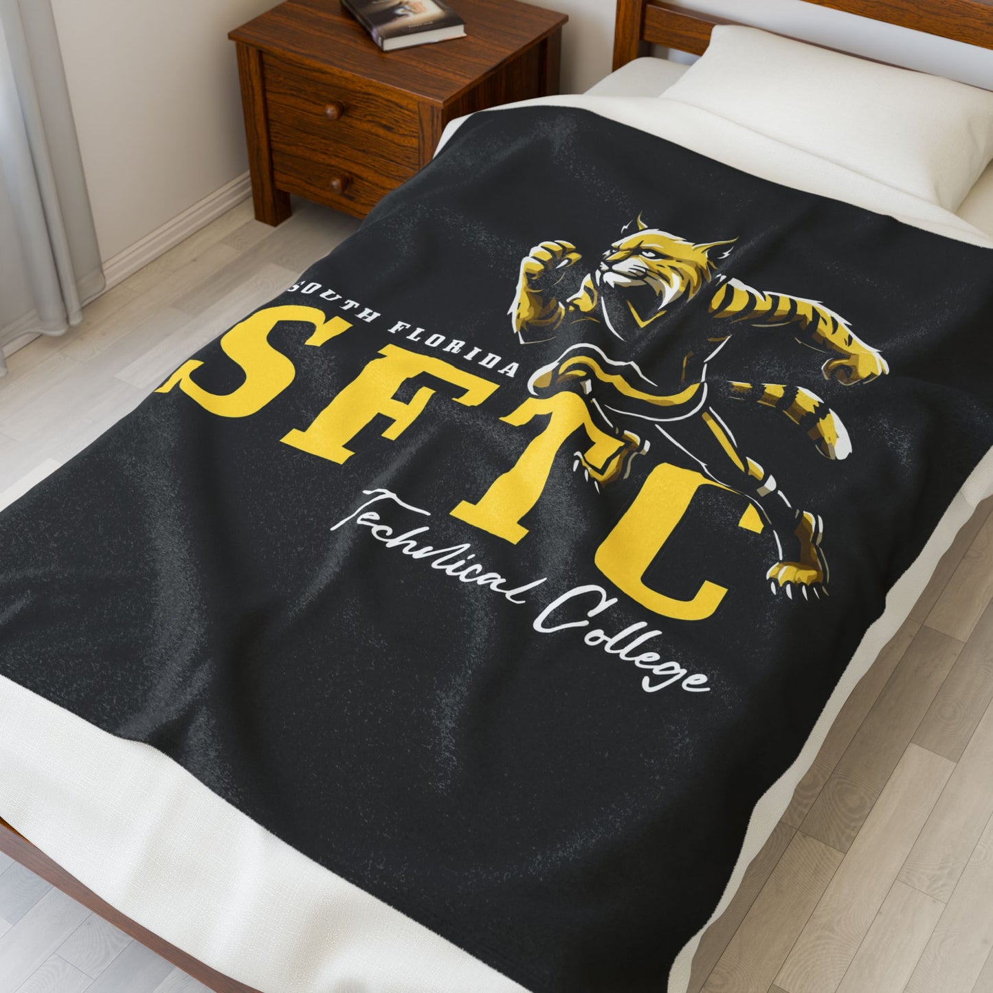 Black SFTC Velveteen Plush Blanket with Bobcat Design
